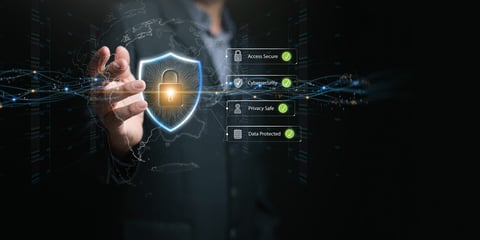 Business hand holding global cybersecurity shield with a digital lock inside a globe. Data protected, privacy safe, secure access, cyber defense, global network security, and digital trust concept.